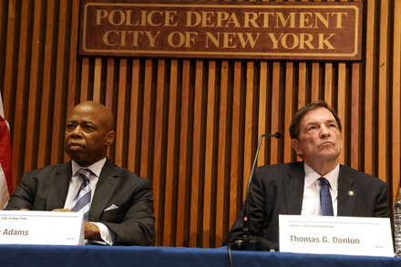 Former NYPD Commissioner Keechant Sewell testifying in court with Mayor Eric Adams looking on.