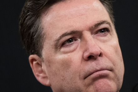 Former FBI Director James Comey testifying before a congressional committee.