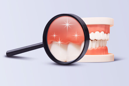 Primer plano de una boca sonriente con dientes sanos y encías rosadas
