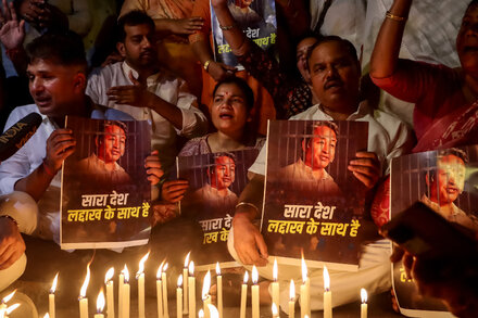 An Indian protest leader is detained by police during a demonstration.