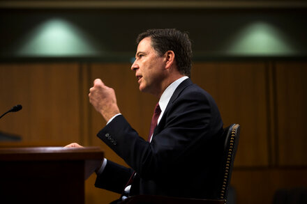 Portrait photo of James Comey, former FBI director, looking serious