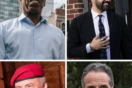 Group photo of New York City mayoral candidates, including Eric Adams, Kathryn Garcia, Curtis Sliwa, and Andrew Yang, looking determined.