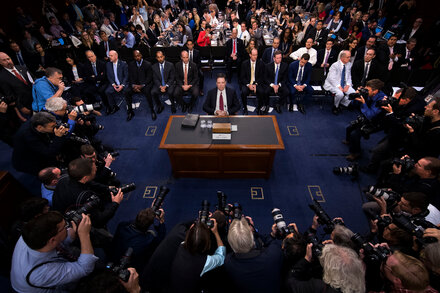 Donald Trump with a stern expression, as James Comey is indicted, highlighting the political implications.