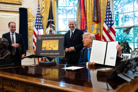Confused individuals looking at paperwork, symbolizing the chaos surrounding Trump's $100,000 visa fee for H1B visas.