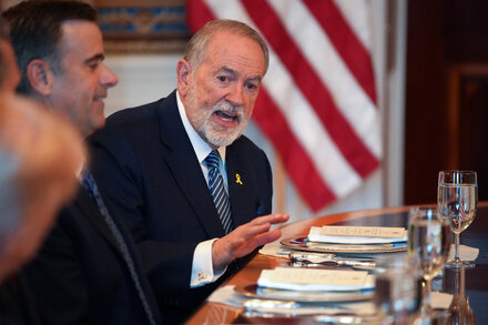 U.S. Ambassador to Israel stands with Egyptian officials in Cairo, discussing diplomatic relations.