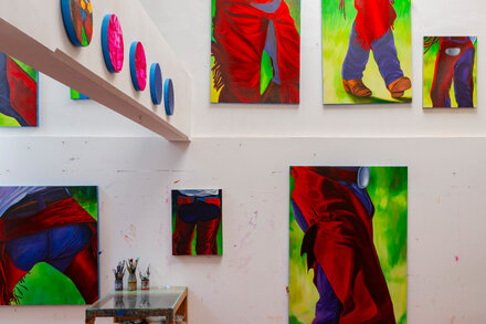 A close-up of a contemporary painting by Ana Segovia, featuring a stylized cowboy figure with striking colors and bold lines, inviting the viewer to examine the details.