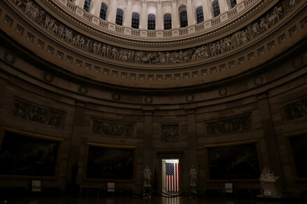 Empty U.S. Capitol Rotunda, symbolizing a government shutdown and its economic impact.
