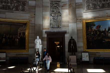 Empty US Capitol building with a 'CLOSED' sign, symbolizing a government shutdown
