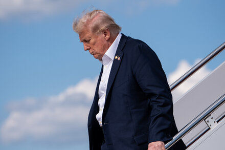 Donald Trump with a serious expression, possibly after a debate or rally, symbolizing his performance in a new major poll.