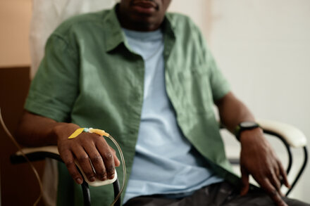 Person looking thoughtfully, representing an early-onset cancer patient sharing their experience