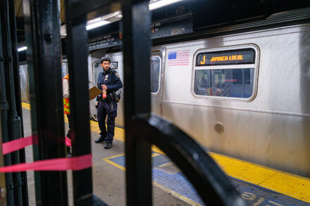 Emergency responders at a J train station in Brooklyn after two girls were found dead on top of a train, suspected to be victims of subway surfing.