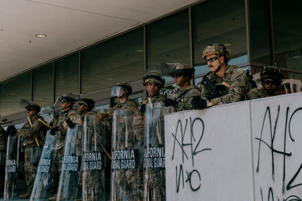 Protesters clash with federal agents during an ICE protest in Portland, Oregon, as the Trump administration considers deploying the National Guard.