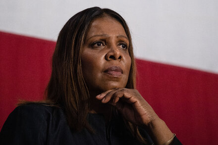 New York Attorney General Letitia James speaks at a podium. The image focuses on the legal complexities of the indictment counts.