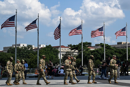 National Guard troops in formation during urban clashes