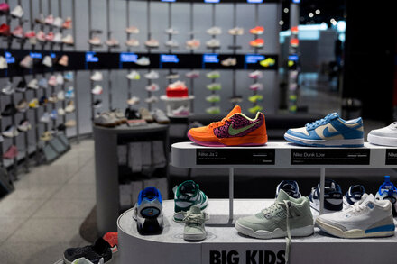 Nike shoe display in a store, representing sales and profit changes