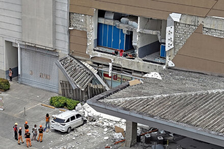 Damaged building and debris after a powerful earthquake in southern Philippines