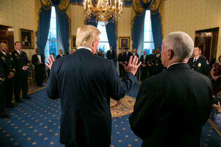 Donald Trump and James Comey in a tense first meeting, setting the stage for their future conflict.
